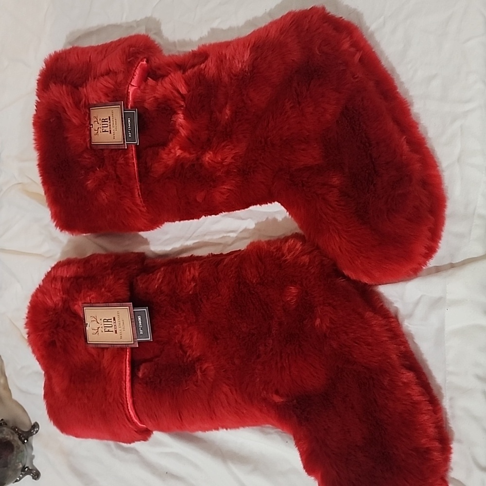two red faux fur stockings
